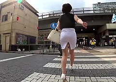 Japanese MILF in white skirt
